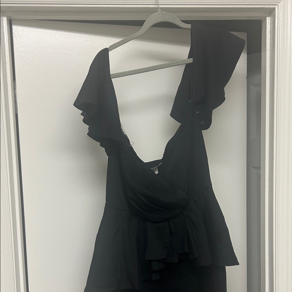 Quum peplum Elegant Black Ruffle sleeve Jumpsuit with peplum at the waist